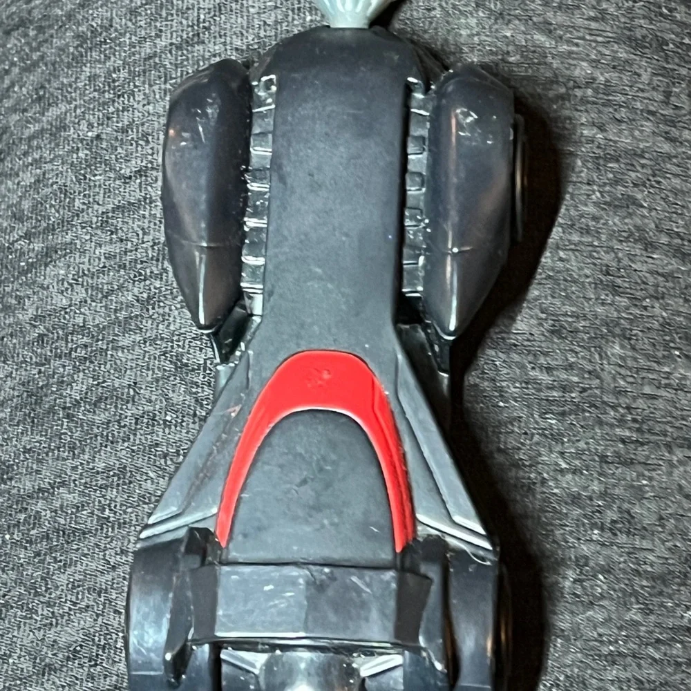 2015 McDonald's Happy Meal toy featuring the Batman Unlimited Batmobile w/Drill